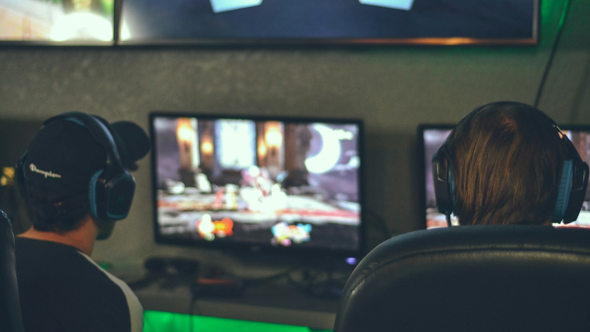 Competitive gaming arena bathed in neon light